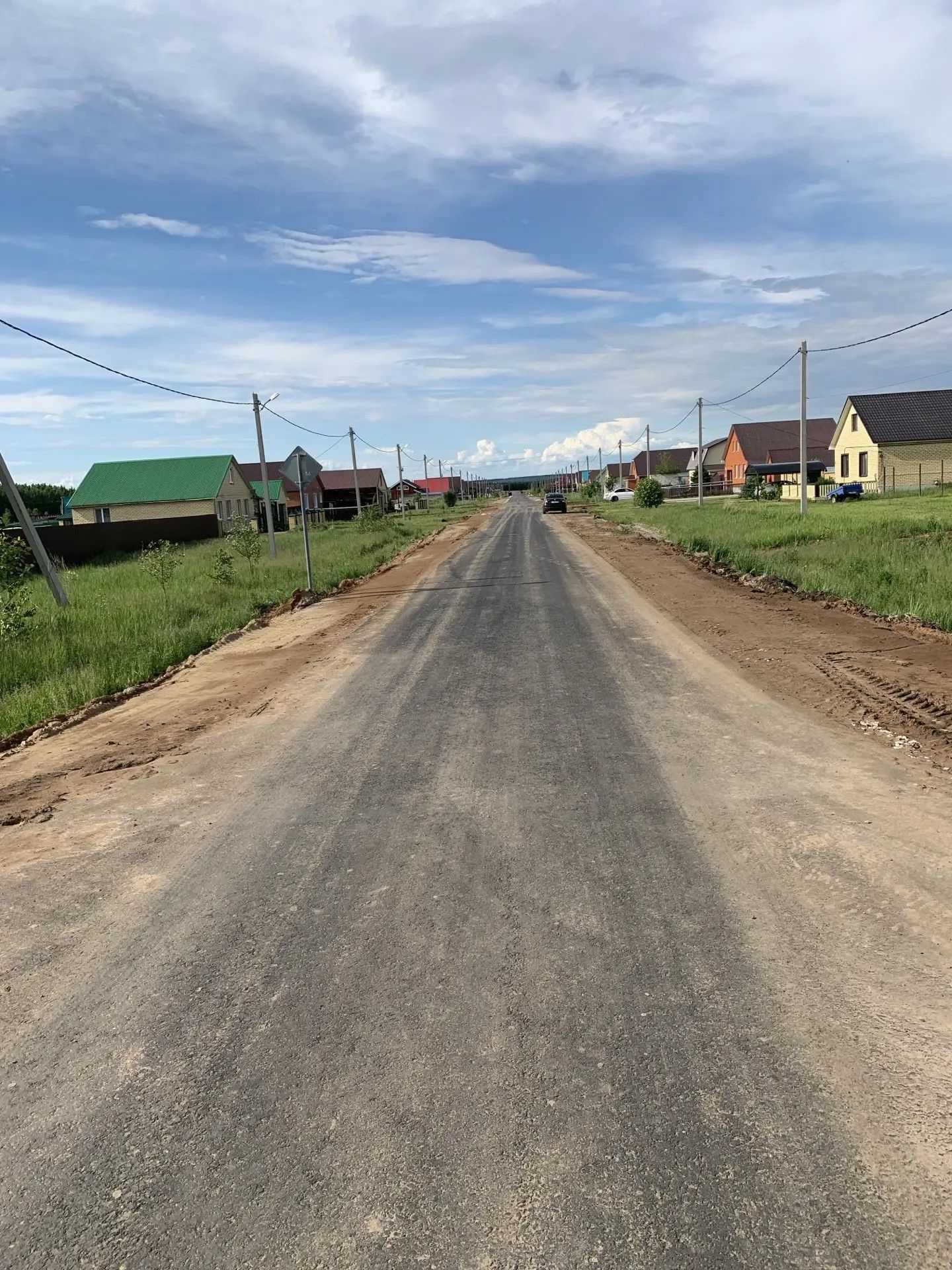 У жителей райцентровской улицы Шагвалиева появилась асфальтированная дорога